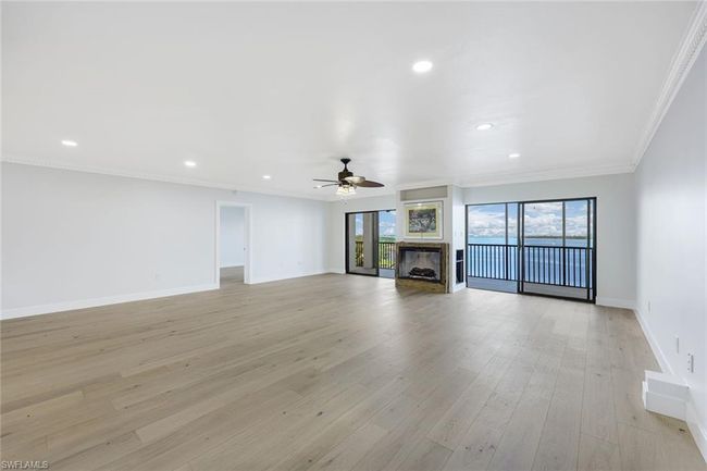 Rare Pecky Cypress wood accents on the fireplace | Image 11