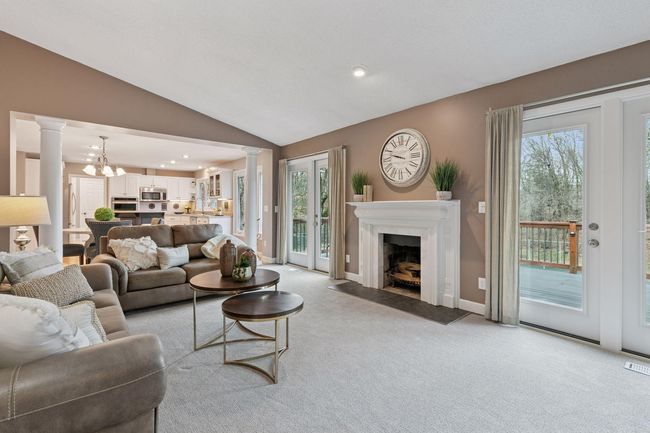 Two sets of patio doors lead to expansive deck | Image 12