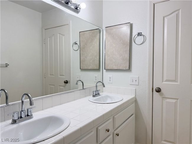 Full bath with double vanity and a sink | Image 34
