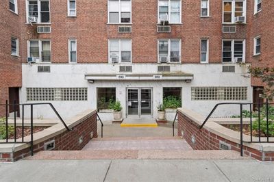 View of building exterior featuring cooling unit | Image 1