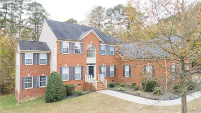 View of property exterior featuring a garage | Image 2