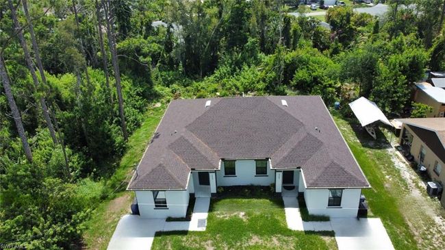 909-911 Homestead Rd S, Home with 6 bedrooms, 4 bathrooms and null parking in Lehigh Acres FL | Image 10