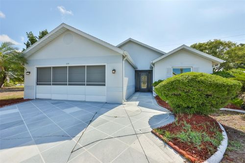 235 Linger Ln, SUN CITY CENTER, FL, 33573-6271 | Card Image