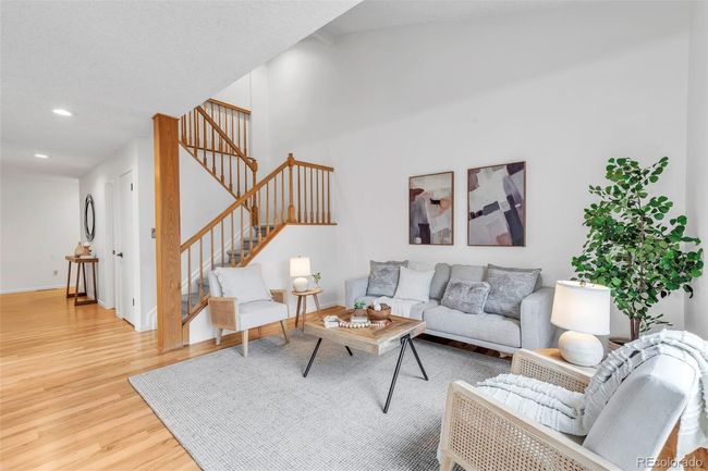 Living room with vaulted ceilings | Image 7