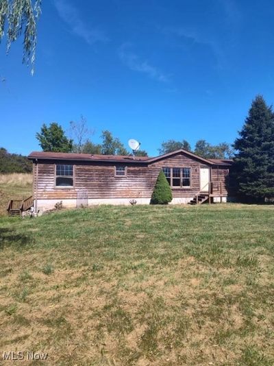 Back of house with a yard | Image 2