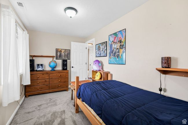View of carpeted bedroom | Image 24