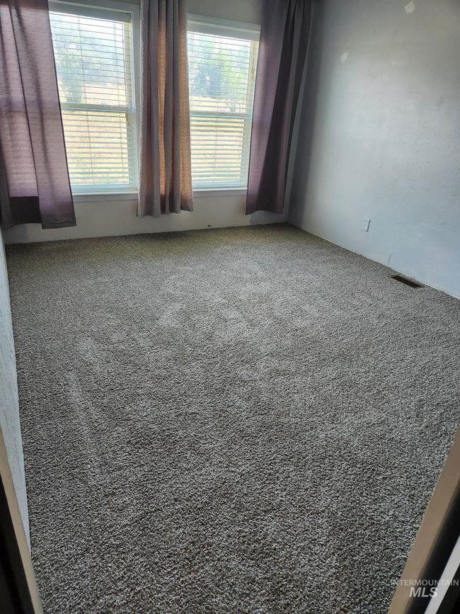 Unfurnished room featuring carpet | Image 7