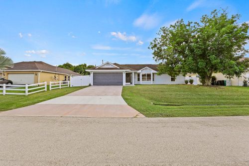 1542 Sw Dycus Ave, Port St Lucie, FL, 34953-5251 | Card Image