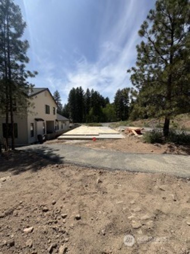 As the newest PNW master-planned community, enjoy 200+ acres of open space, trails & the Coal Trax Mt Bike Park. Soaring ceilings in the great roommake each day worthy of celebration & open floorplan appeals to entertaining. Covered deck & patio. Southern-facing homesites range from the mid600s- 900ks. Enjoy a variety of innovative & distinctive new home options with the best all-season recreation just moments away! Built for the future, indulge in a retreat just 90-min to Seattle. Plans and elevations are artist’s renderings only, may not accurately represent the actual condition of a home asconstructed and may also contain options and upgrades which are not included in the sale. Trailside Homes reserves the right to make changes to the floorplan, specifications, dimensions, design and elevations without prior notice. Stated dimensions and square footage are estimated and should not be usedas representations of the home’s actual size. | Image 8