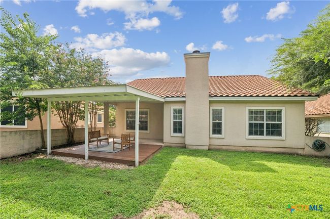 Another view of the back deck and patio. | Image 16