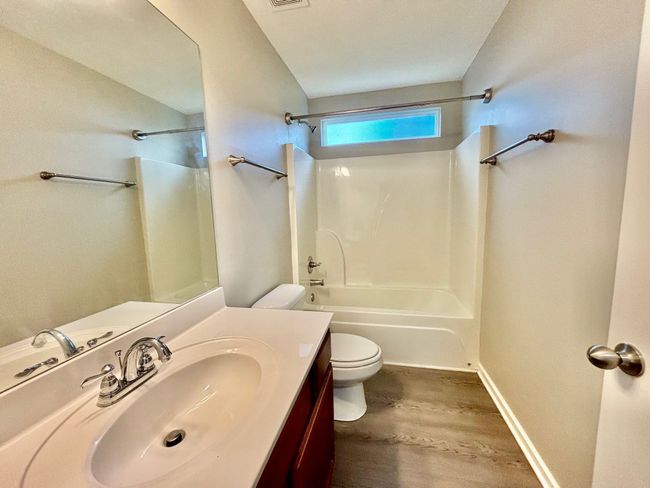Guest bath has LVP flooring as well | Image 14