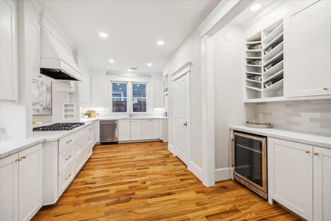 Luxurious kitchen with lots of storage and a huge walk-in pantry | Image 15