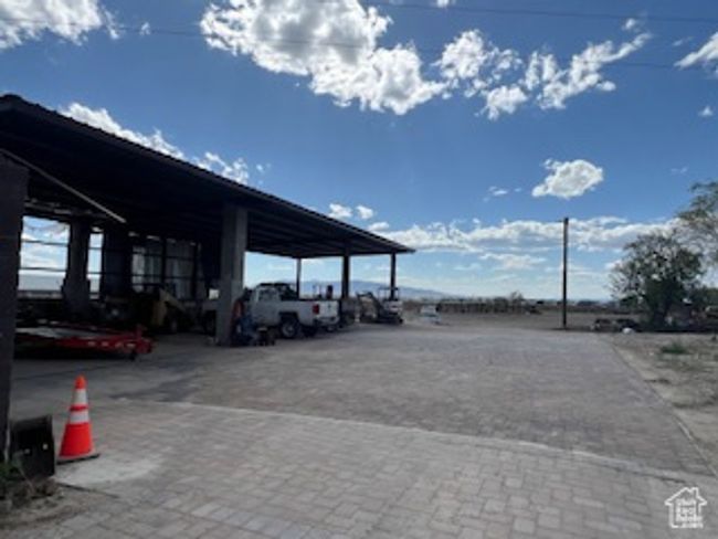 View of vehicle parking with a carport | Image 5