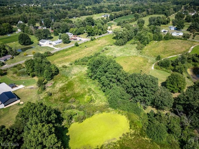 Birds eye view of property with a forest view | Image 13