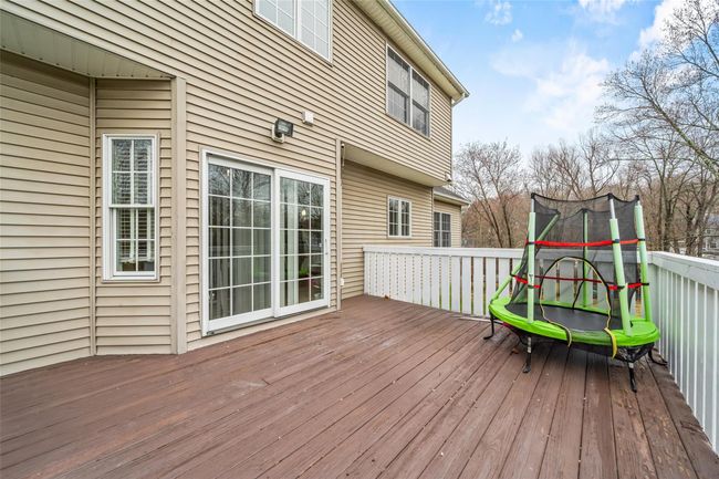 Wooden terrace with a trampoline | Image 42