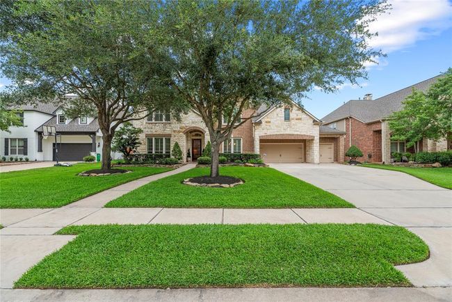 Mature trees shade the home in the afternoon. | Image 47