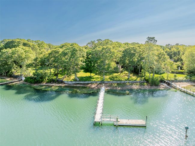 Water view with a floating dock | Image 36