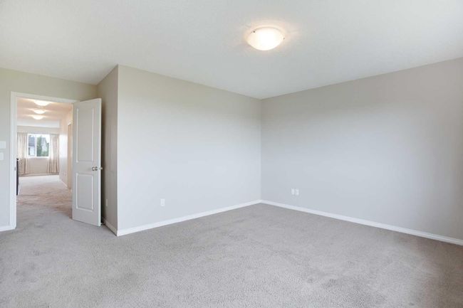 32 Drake Landing Hill, House other with 3 bedrooms, 3 bathrooms and 4 parking in Okotoks AB | Image 24