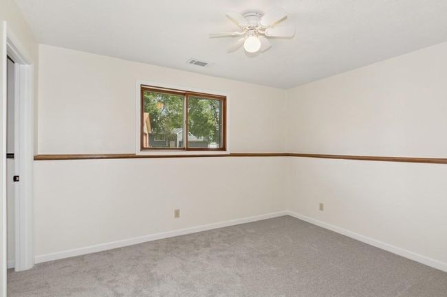 Second bedroom has excellent natural light & WIC | Image 15