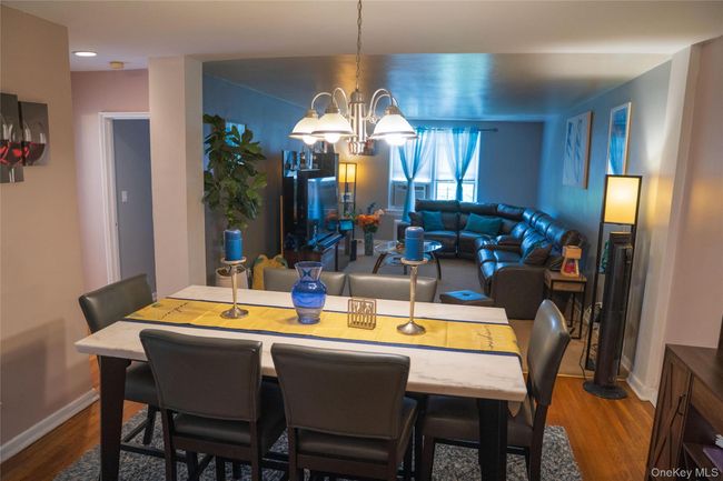 Dining space featuring wood finished floors. | Image 5