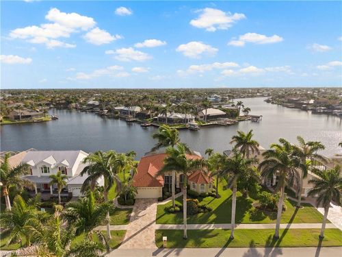 1069 Sw 57th St, CAPE CORAL, FL, 33914-8044 | Card Image