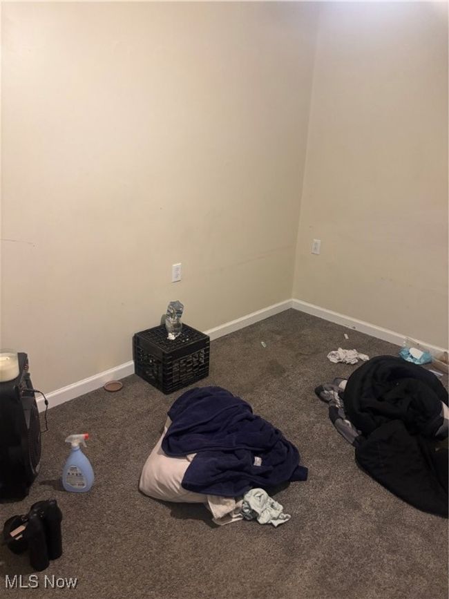 Unfurnished room featuring carpet and baseboards | Image 6