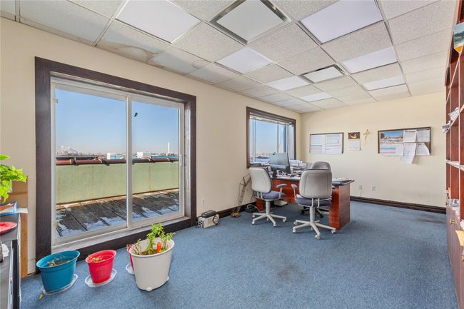 Office area featuring carpet and a drop ceiling | Image 20