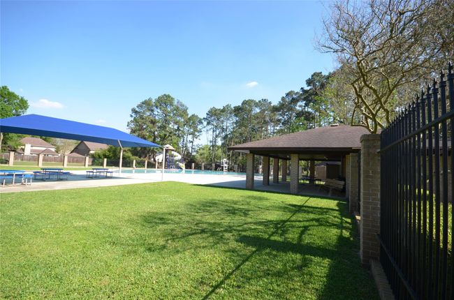 Just down the street, One of 2 neighborhood pools and parks available | Image 49