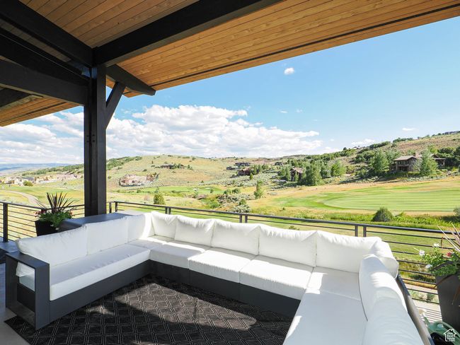 Patio / terrace featuring an outdoor living space | Image 13