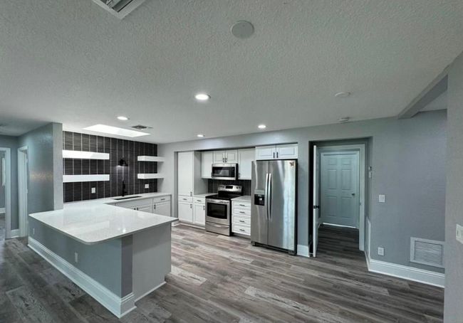 463 Nw Ravenswood Ln, House other with 4 bedrooms, 3 bathrooms and null parking in Port St Lucie FL | Image 4
