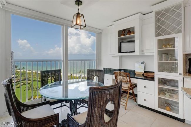 Sunroom featuring built in desk | Image 19
