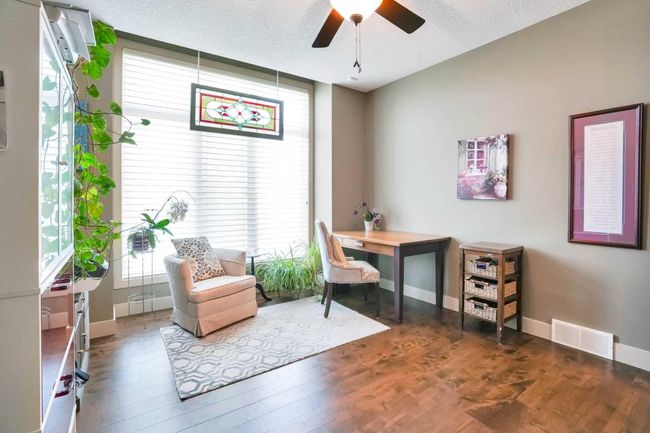 511 Evergreen Circle Sw, House other with 3 bedrooms, 3 bathrooms and 4 parking in Calgary AB | Image 5