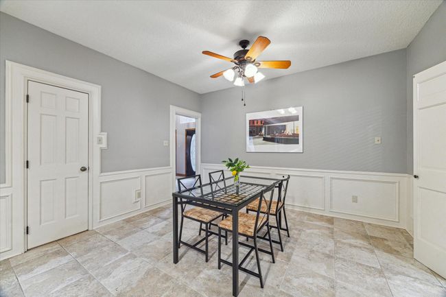 The 13’x12’ breakfast room has plenty of space to help everyone get going in the morning. The door to the left opens to the generous walk-in pantry. | Image 13