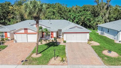 1940 Grand Cypress Ln, SUN CITY CENTER, FL, 33573-4806 | Card Image