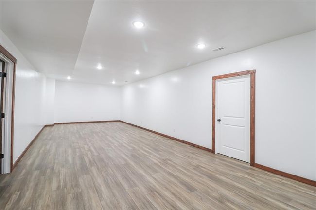 Empty room with light hardwood / wood-style flooring | Image 40