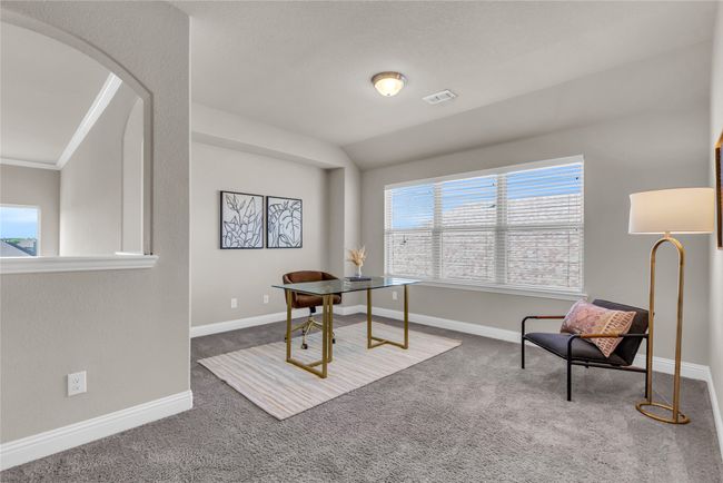 Carpeted office featuring arched walkways, baseboards, and ornamental molding | Image 20