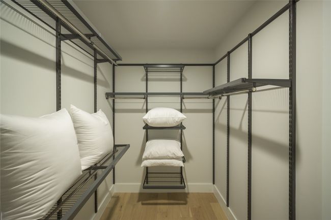 Spacious closet featuring wood finished floors | Image 25