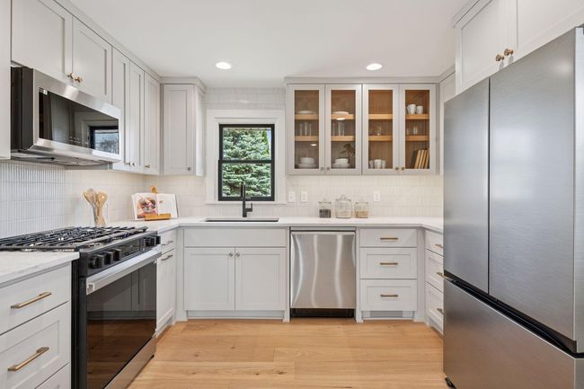 Upgraded hardware & faucet are just a few of the quality upgrades in the kitchen. | Image 11