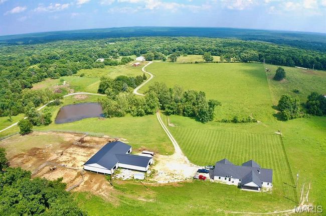Aerial view of sparsely populated area | Image 9
