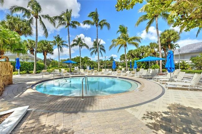 View of swimming pool featuring a patio area | Image 40