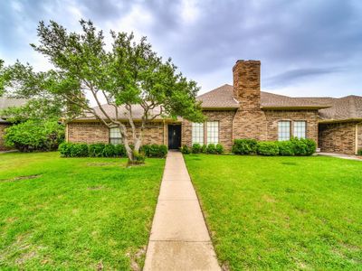 View of front of home with a front lawn | Image 1