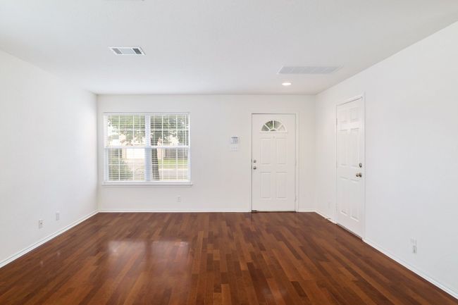Entryway featuring visible vents, recessed lighting, dark wood-style floors, and baseboards | Image 6