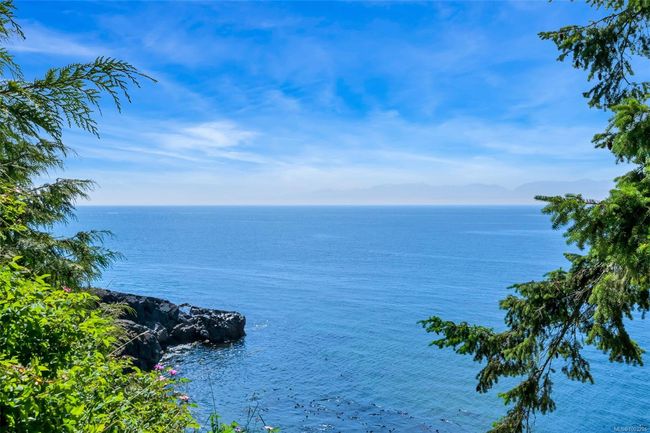 Water view featuring a mountainous background | Image 26