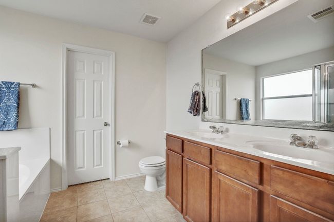Dual vanities, tile floor | Image 18