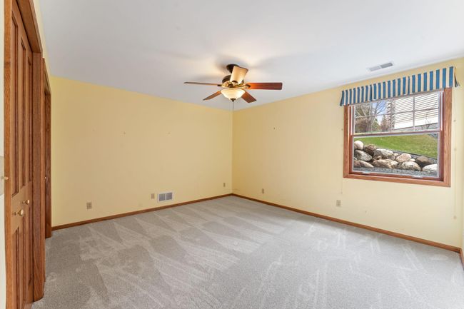 9946 Wellington Ln, Townhouse with 4 bedrooms, 3 bathrooms and null parking in Woodbury MN | Image 37