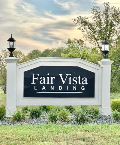 One of three lighted entrances into the subdivision. | Image 1