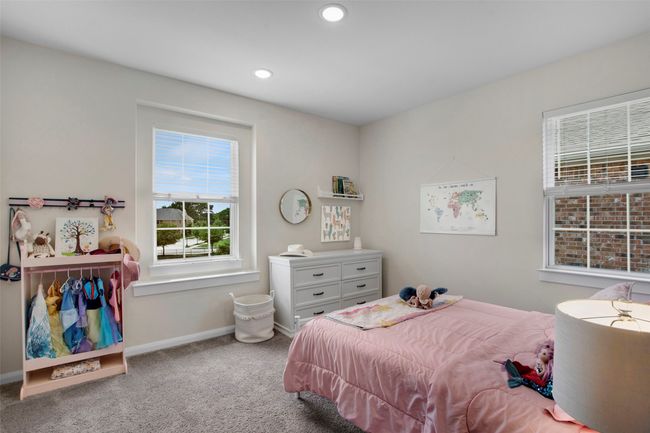 Bedroom featuring baseboards, carpet flooring, and recessed lighting | Image 24