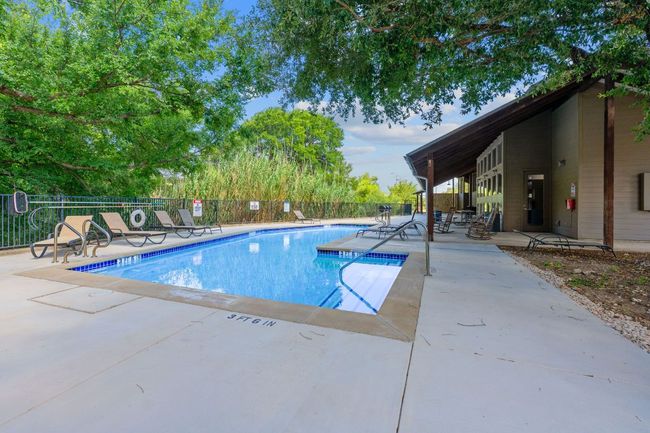 Community pool featuring a patio area | Image 25