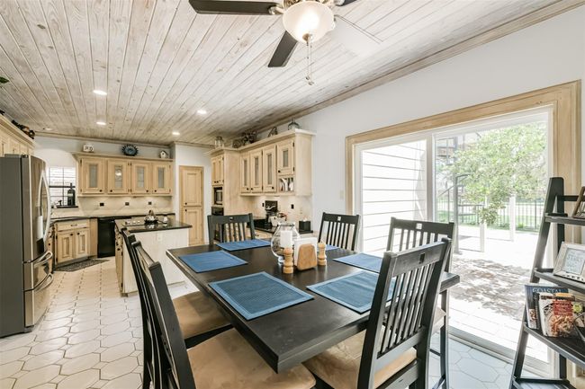 Breakfast room also has wonderful views along with sliding patio doors | Image 18