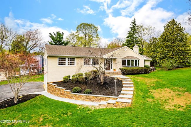 Professionally landscaping gives this ranch great curb appeal! | Image 6